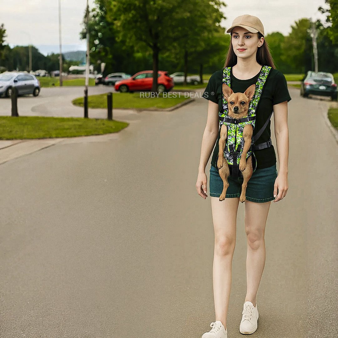 Woman walking outdoors with a small brown dog in a camouflage green backpack carrier strapped to her chest