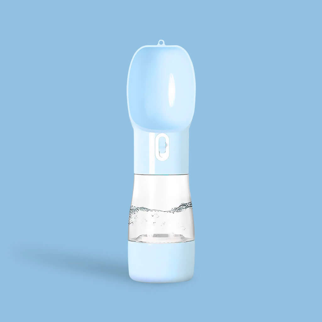 Light blue PetPal Water & Snack Bottle with flip-up spout, water dispensing button, and transparent midsection against a matching background.